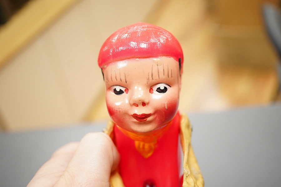 An early boxed Tri-ang Gyro-Cycle, with a gyroscope contained within the front wheel of the bicycle, providing power to the toy, template bicycle with celluloid rider, the box with original inner card holder and a sealed